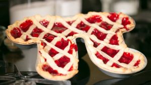 A pie baked in the form of a pi symbol